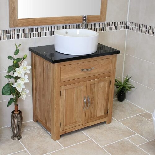 Side View of Round White Ceramic Basin on Black Quartz Topped Oak Vanity Unit