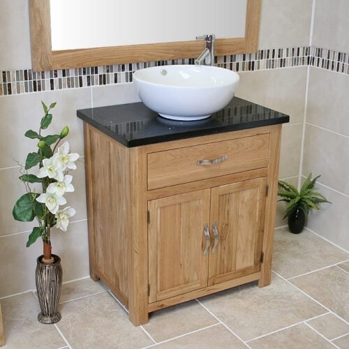 Far Side View of Round Curved White Ceramic Basin on Black Quartz Topped Oak Vanity Unit