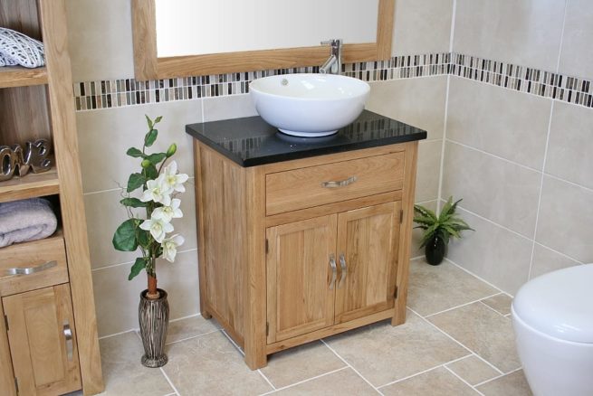 Far Side View of Round Curved White Ceramic Basin on Black Quartz Topped Oak Vanity Unit