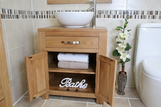 Oval White Ceramic Basin on Vanity Unit with Open Doors