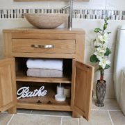 Front View of Travertine Basin on Single Oak Top Vanity Unit Showing Storage