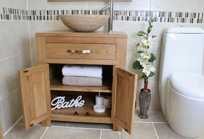 Front View of Travertine Basin on Single Oak Top Vanity Unit Showing Storage