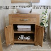 Oval White Ceramic Basin on Vanity Unit with Open Doors
