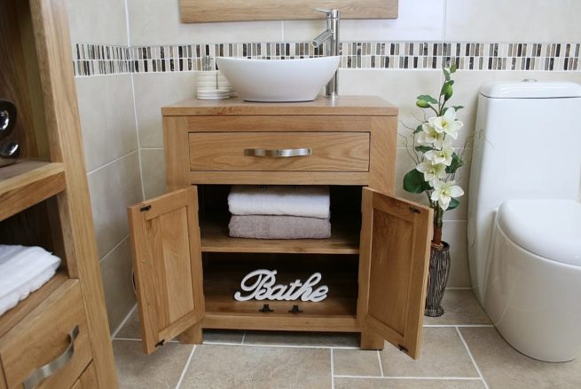 Oval White Ceramic Basin on Vanity Unit with Open Doors