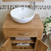 Above Close View of Round Curved White Ceramic Basin on Oak Vanity Unit with Open Doors