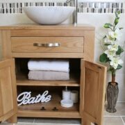 Front View of White Marble Basin on Single Oak Top Vanity - Showing Storage