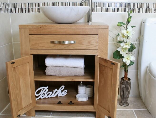 Front View of White Marble Basin on Single Oak Top Vanity - Showing Storage