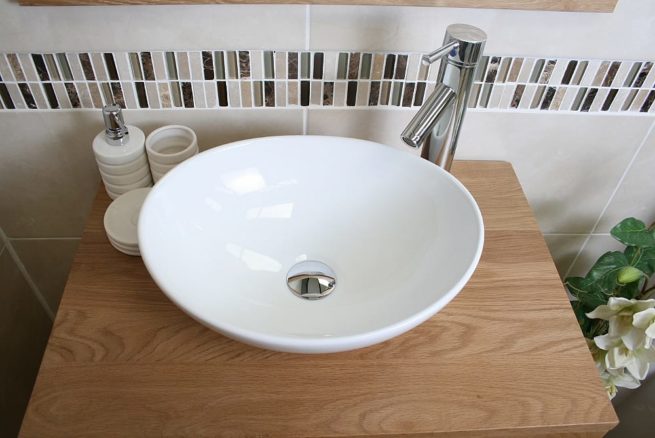 Above View of Oval White Ceramic Basin on Single Oak Top Vanity Unit