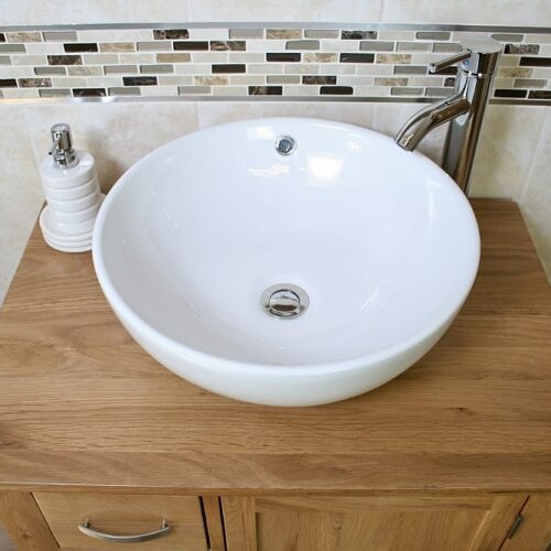 Above View of White Ceramic Round Curved Bathroom Basin on Oak Top Vanity Unit
