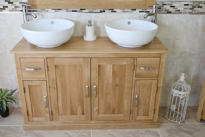 Two White Ceramic Round Basins on Oak Topped Vanity