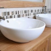 Side Close-up of Two Round White Ceramic Basins on Oak Top Vanity Unit