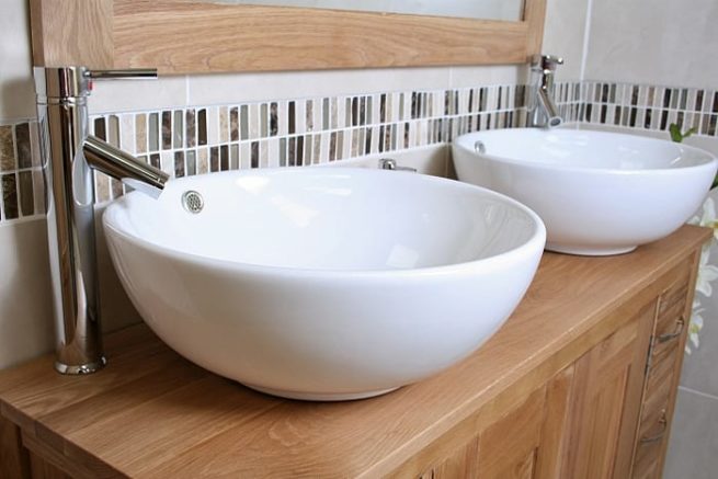 Side Close-up of Two Round White Ceramic Basins on Oak Top Vanity Unit