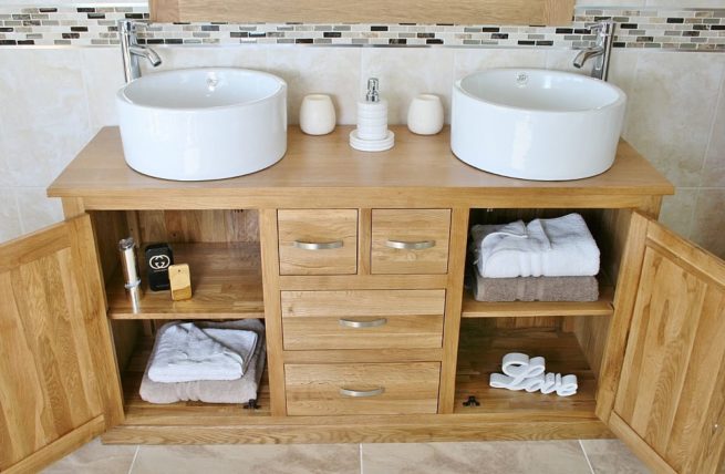 Open Doors on Large Oak Topped Vanity Unit with Two White Ceramic Bowls