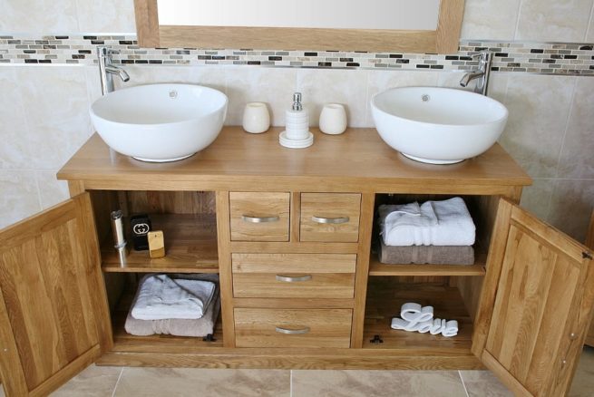 Open Drawers on Large Oak Top Vanity Unit with Two White Ceramic Round Basins