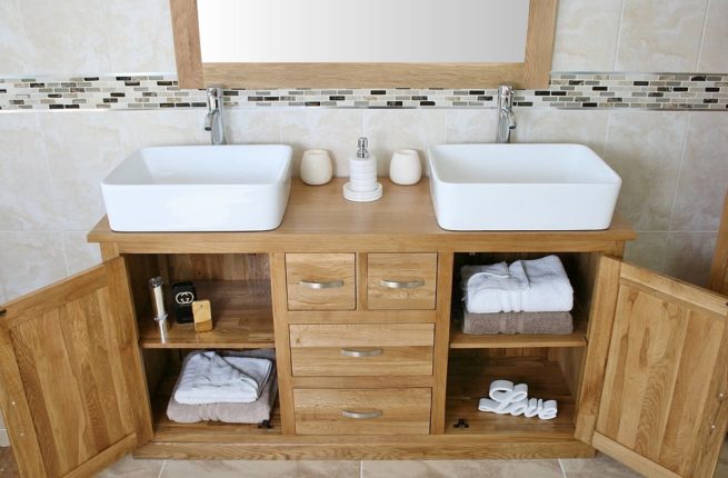 Open Drawers on Large Oak Topped Vanity Unit with Two White Ceramic Rectangle Basins