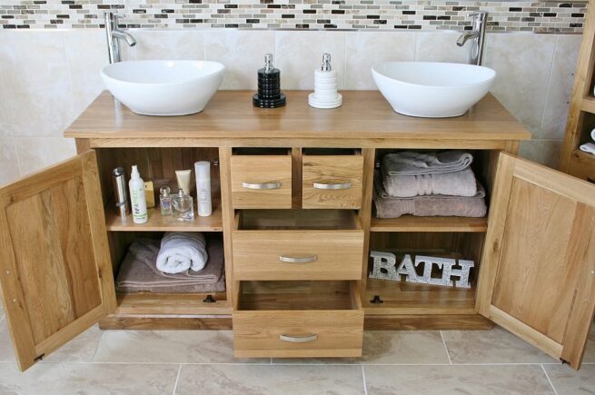 Showing all Storage in Double Basin Oak Topped Vanity Unit with White Ceramic Oval Basins