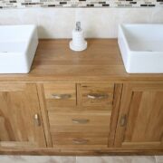 Above Close-Up Side View of White Ceramic Oval Basins on Large Oak Vanity Unit with Oak Top Finish
