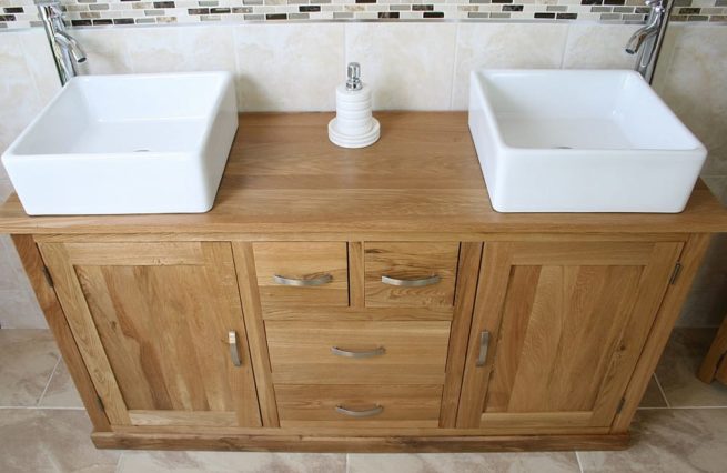 Above Close-Up Side View of White Ceramic Oval Basins on Large Oak Vanity Unit with Oak Top Finish