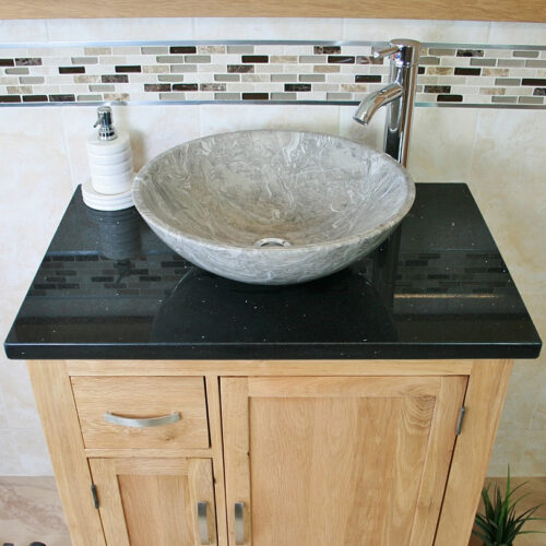 Above View of Oval Grey Marble Basin on Black Quartz Top Vanity Unit