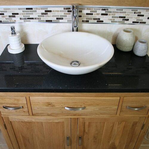 White Marble Oval Basin on Black Quartz Top Vanity Unit - Above View