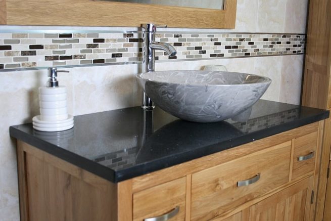 Close Up Side View of Quartz Top Vanity Unit with Oval Grey Marble Basin