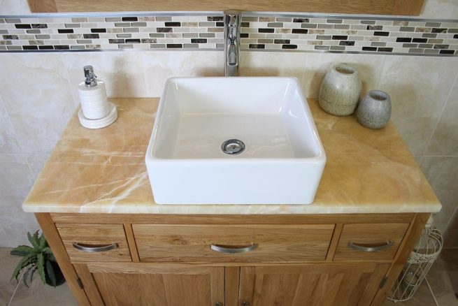 Above View of White Rectangle Ceramic Wash Basin on Golden Onyx Topped Vanity Unit