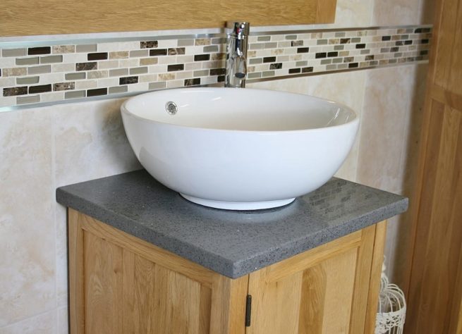 Close-up View of Round White Ceramic Basin on Grey Quartz Topped Vanity