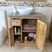 Open Grey Quartz Top Vanity Unit with White Ceramic Oval Basin Showing Storage