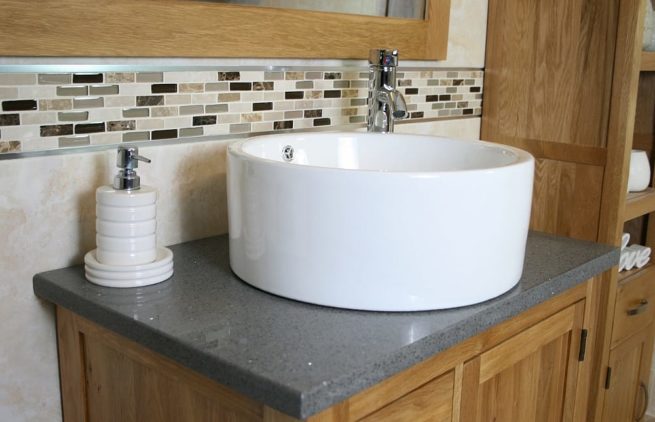 Side View - White Round Ceramic Basin on Grey Quartz Top