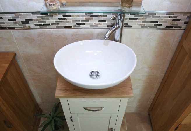 Above View of White Ceramic Basin on Oak Top of Painted Single Vanity Unit