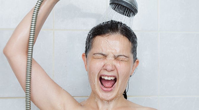 Person shocked by cold shower