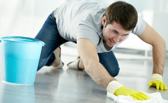 A Man Washing the Bathroom Floor for Valentine's Day Man washing bathroom floor
