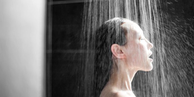 Lady With Shower Washing Over Her Head
