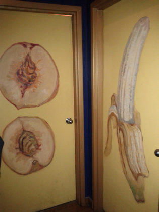 A Fruity Looking Toilet Sign